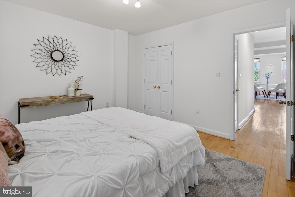 1810 California Street Northwest, Unit 202 Washington, DC 20009 - Photo 26 of 52 Serene bedroom with natural light.