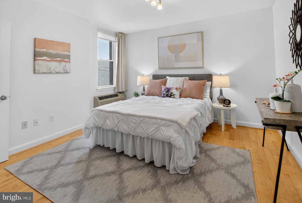 1810 California Street Northwest, Unit 202 Washington, DC 20009 - Photo 27 of 52 Serene bedroom with modern elegance.