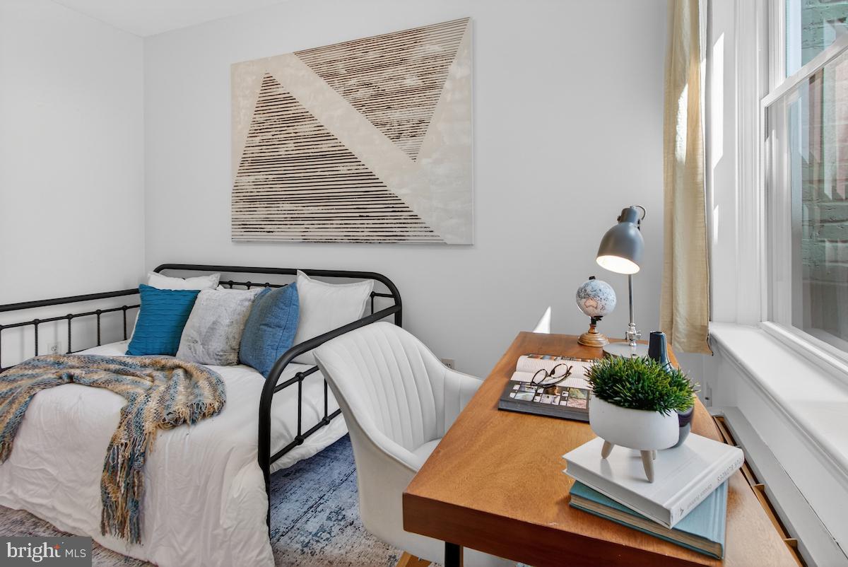 1810 California Street Northwest, Unit 202 Washington, DC 20009 - Photo 30 of 52 Cozy bedroom with modern accents.