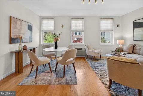 a living room with furniture and a couch