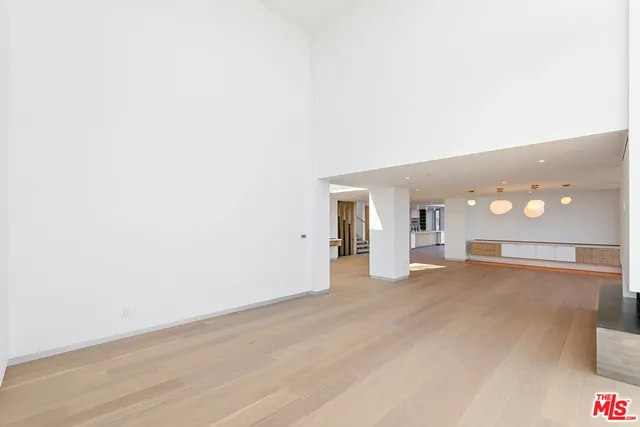 a view of swimming pool with a lounge chair