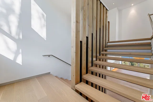 a bathroom with a bathtub and a sink
