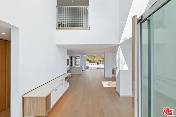 a view of an entryway with a room