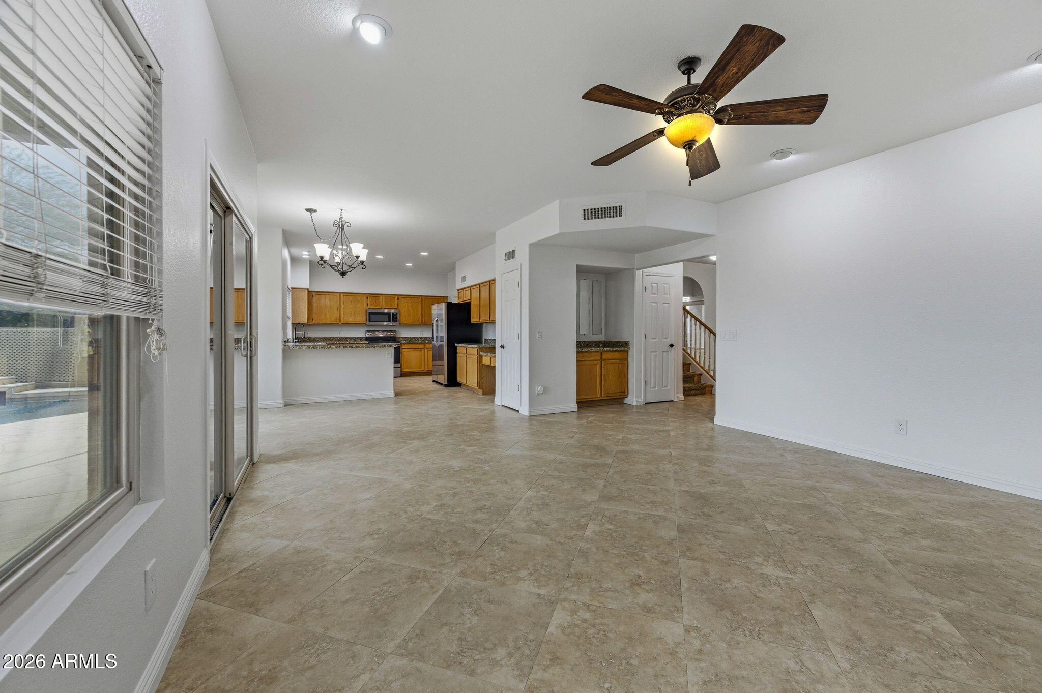 16601 South 15th Street Phoenix, AZ 85048 - Photo 20 of 62 a view of a livingroom with a ceiling fan and window