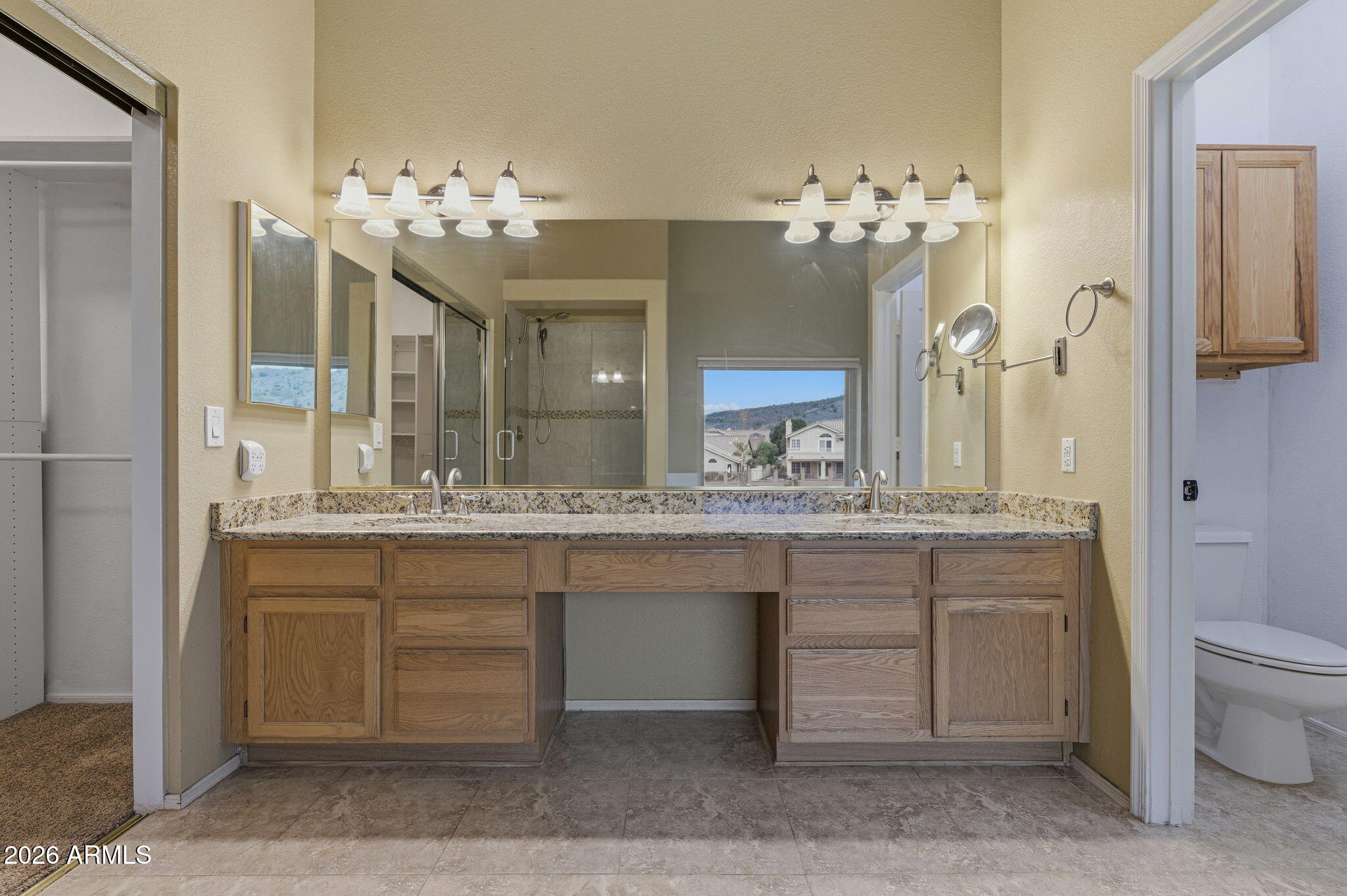16601 South 15th Street Phoenix, AZ 85048 - Photo 43 of 62 a bathroom with a sink double vanity and a mirror