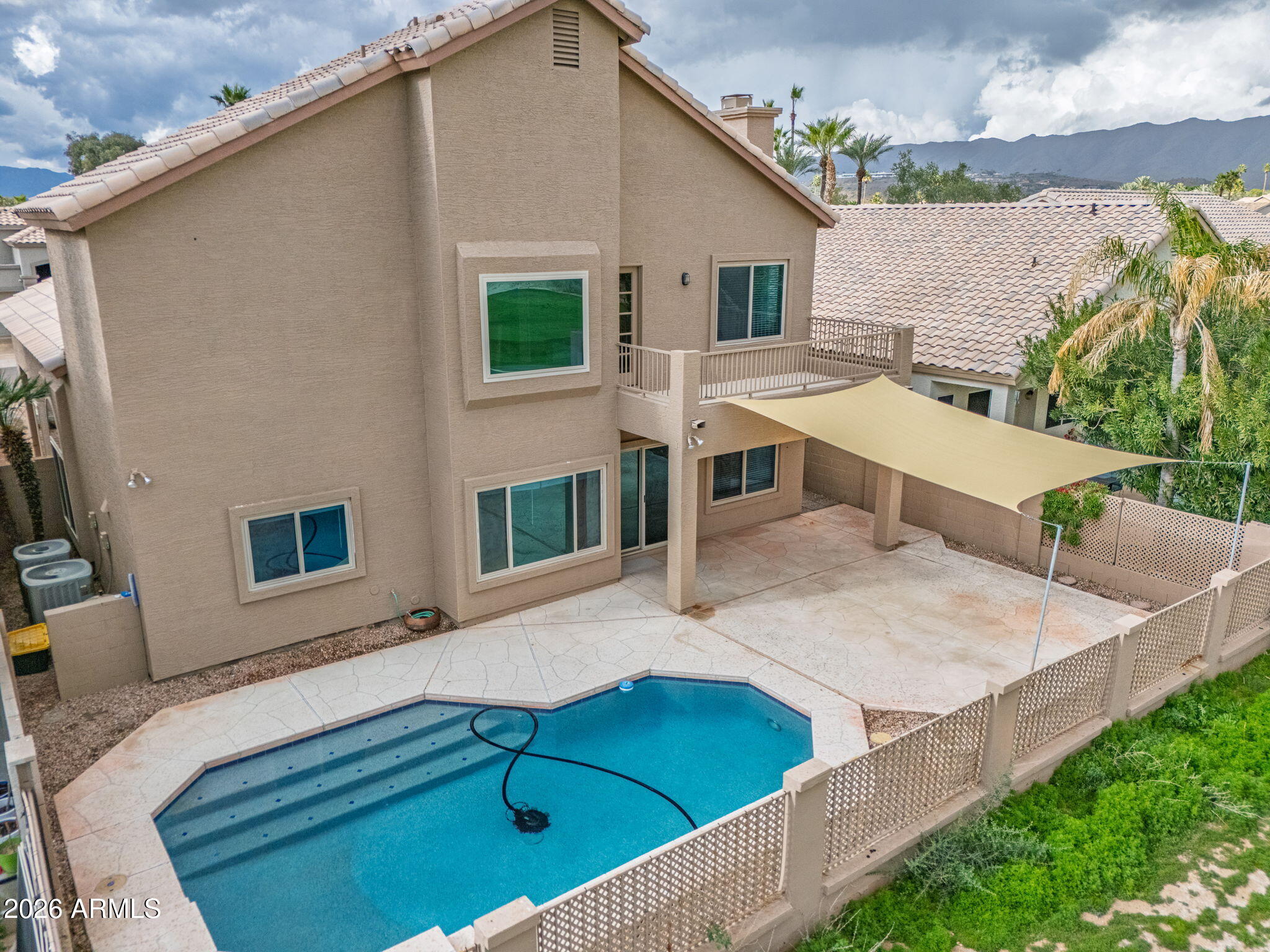 16601 South 15th Street Phoenix, AZ 85048 - Photo 54 of 62 a view of a house with backyard and sitting area