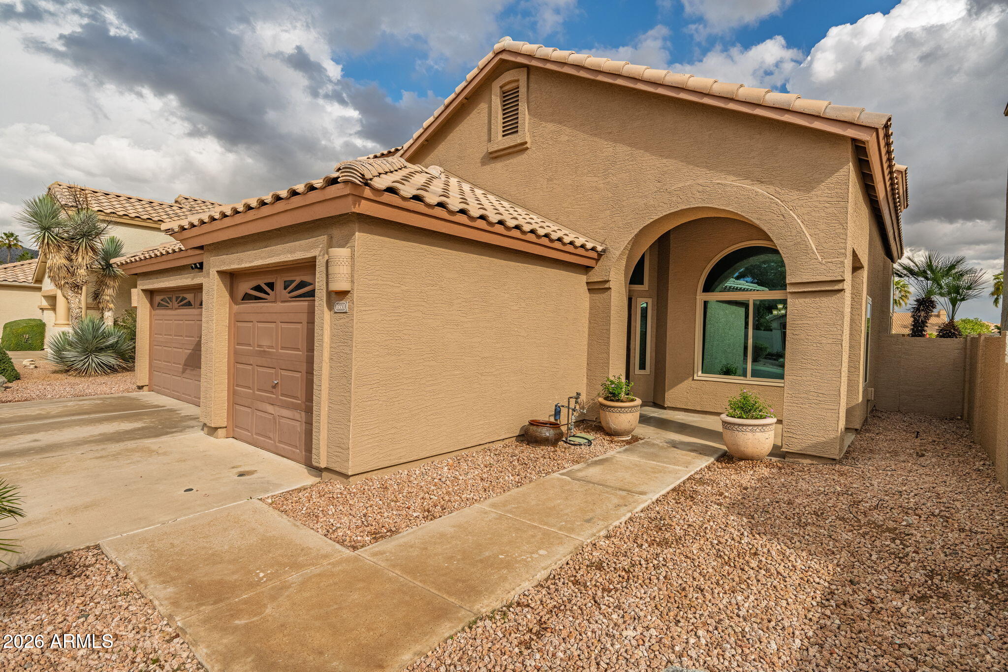 16601 South 15th Street Phoenix, AZ 85048 - Photo 5 of 62 a front view of a house with yard