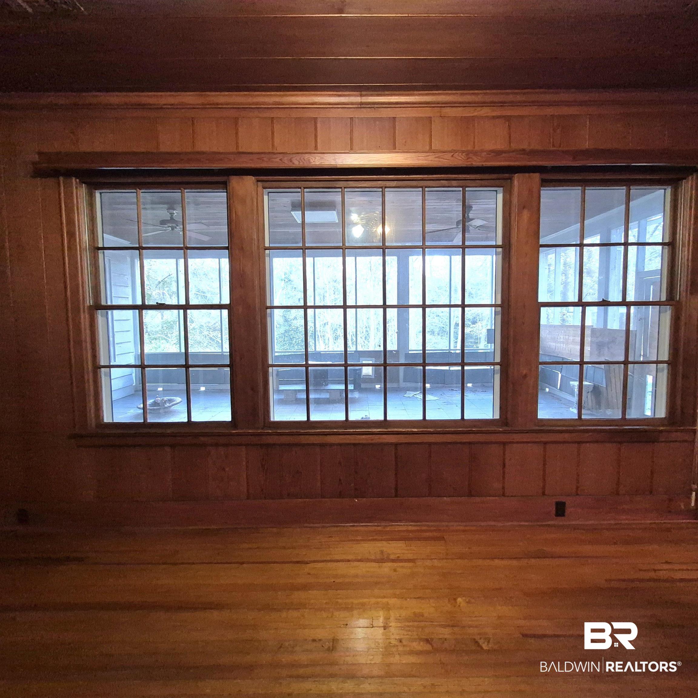308 Rural Street Evergreen, AL 36401 - Photo 22 of 40 Detailed view of wood walls and wood finished floors
