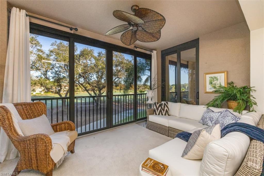 770 Regency Reserve Circle, Unit 1803 Naples, FL 34119 - Photo 16 of 35 Sunroom with carpet flooring