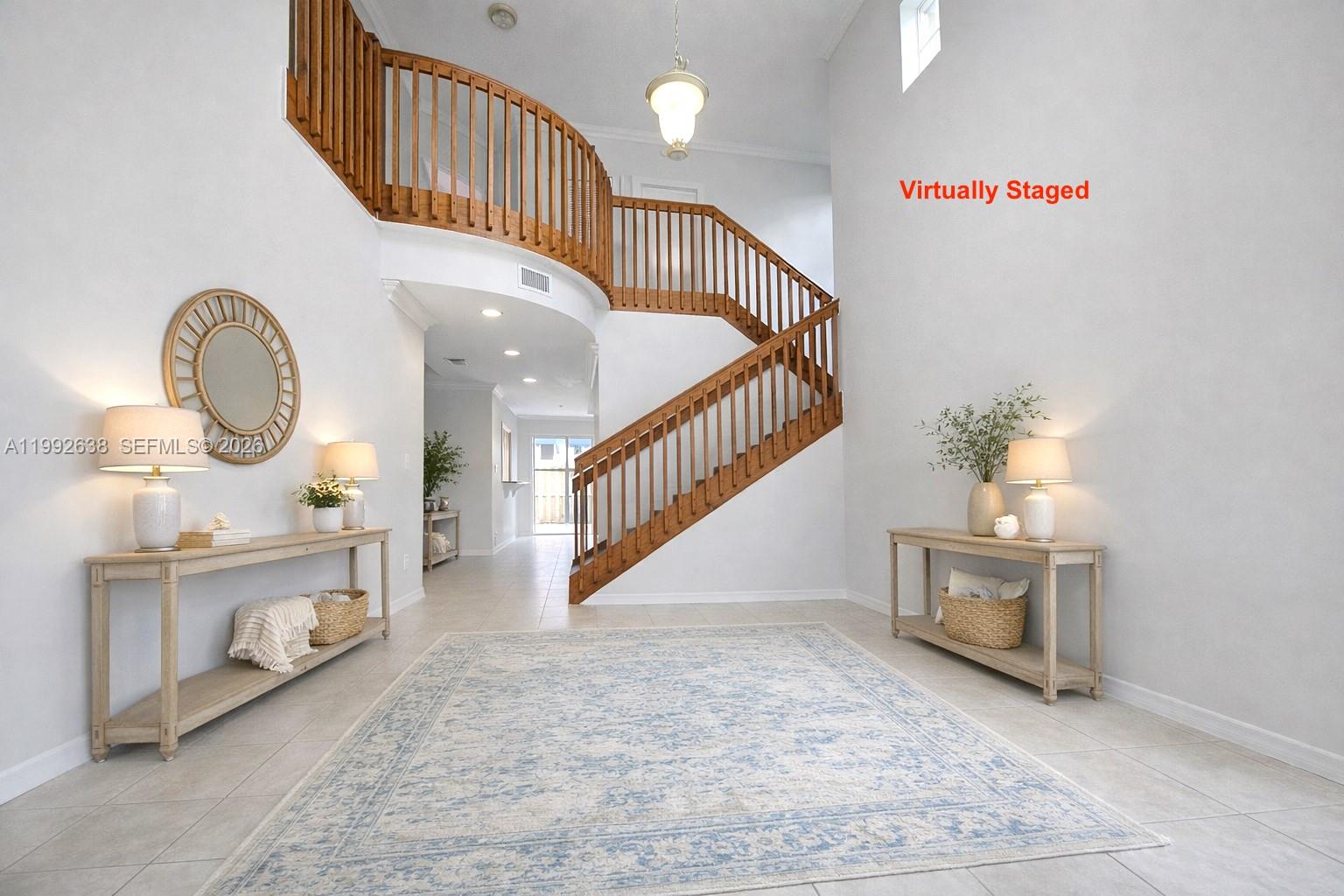 8421 Southwest 124th Avenue, Unit 101 Miami, FL 33183 - Photo 4 of 20 a view of entryway livingroom and hall with wooden floor