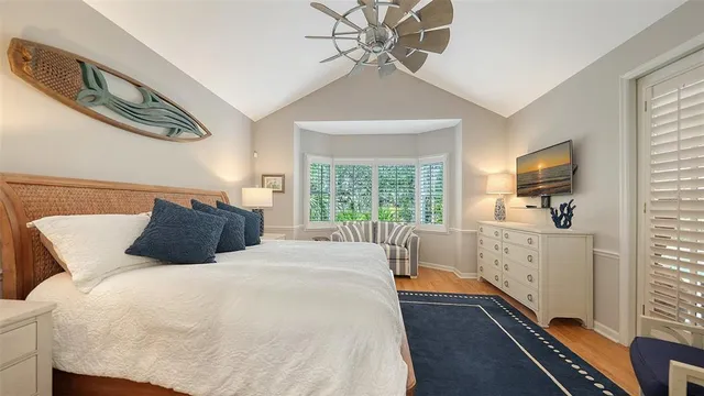 a view of a patio with couches and potted plants