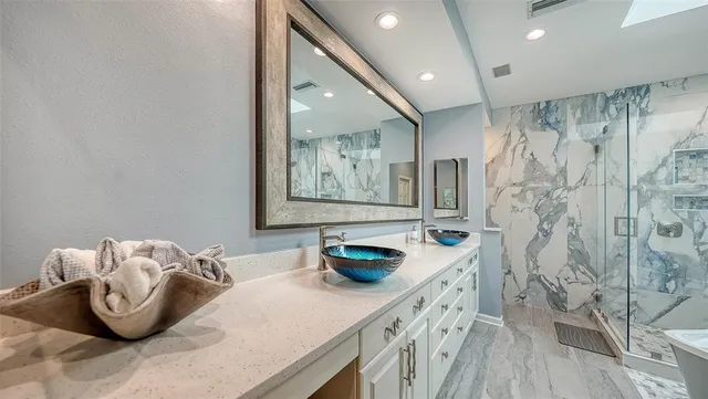 a view of a balcony with wooden fence