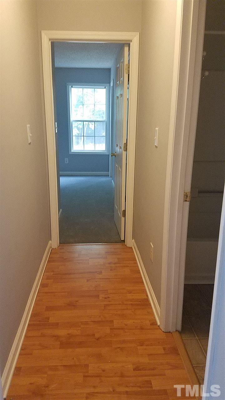 6012 Newhall Road Durham, NC 27713 - Photo 14 of 23 a view of an empty room and window