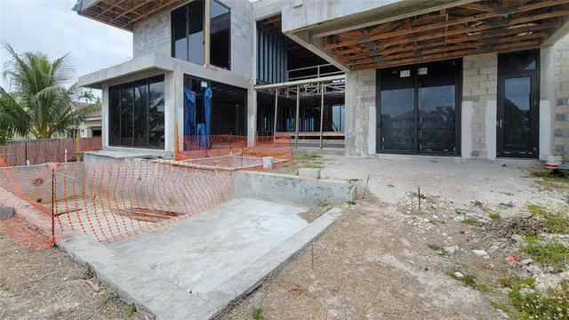 front view of a house with a large window