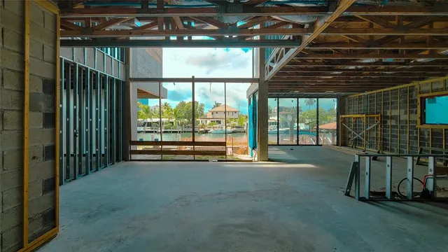 a view of empty room with floor to ceiling window