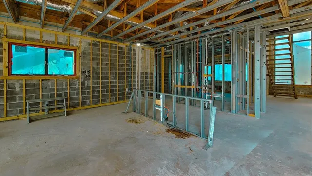 a view of empty room with windows