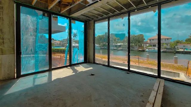 a swimming pool with glass windows