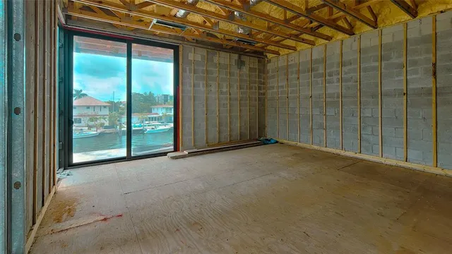 a view of a room with large windows