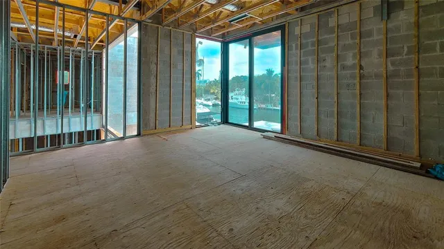 a view of a room with large windows