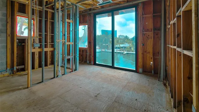 an aerial view of a house with outdoor space