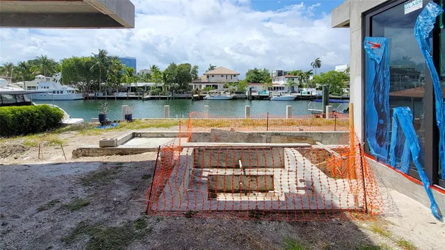 a view of a lake with a building in the background