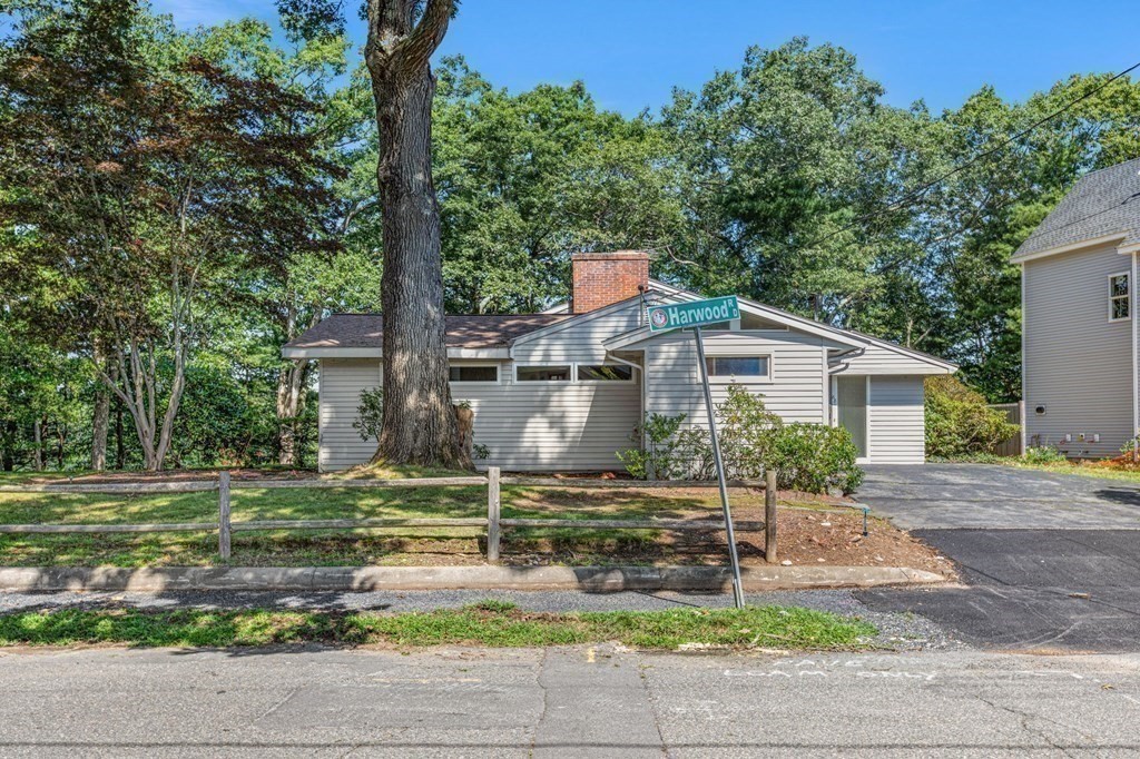 68 Harwood Road Natick, MA 01760 - Photo 34 of 37 a front view of a house with garden