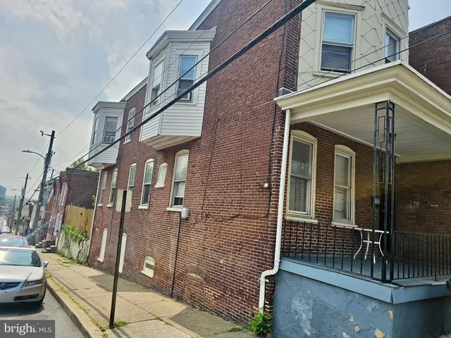 a view of a brick building with a shower