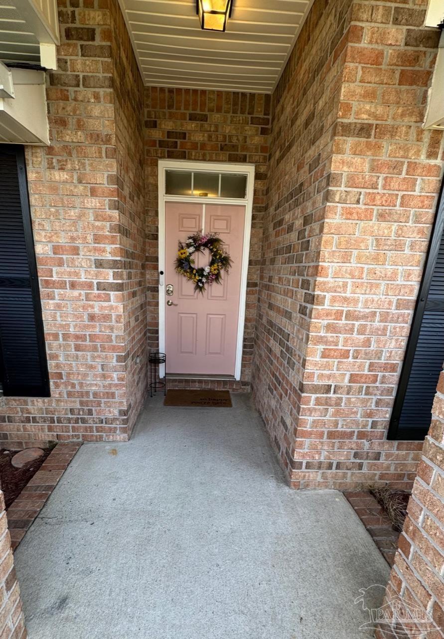 4930 Chads Circle Pace, FL 32571 - Photo 1 of 18 a view of front door of house