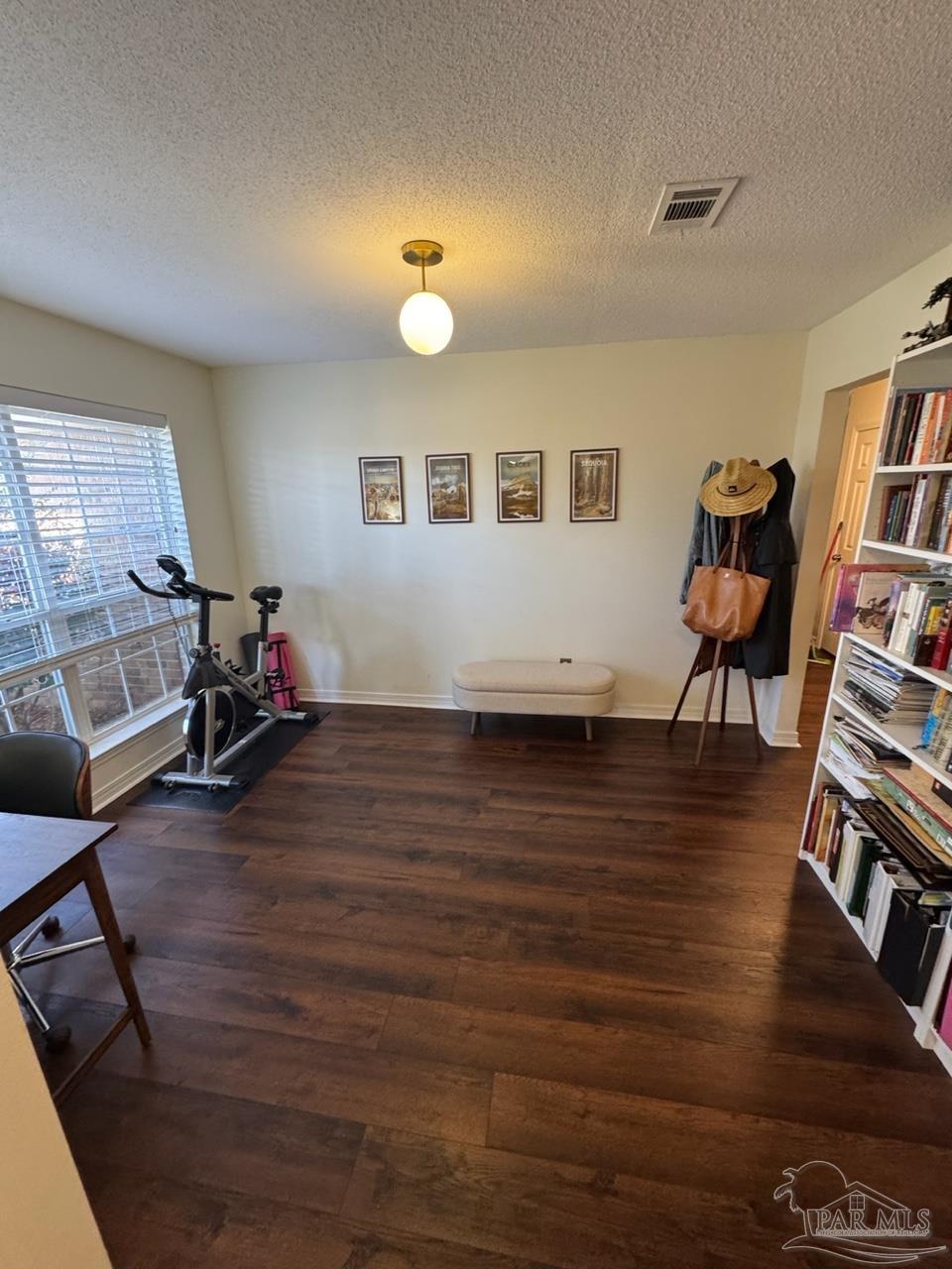 4930 Chads Circle Pace, FL 32571 - Photo 11 of 18 a view of a room with furniture and wooden floor