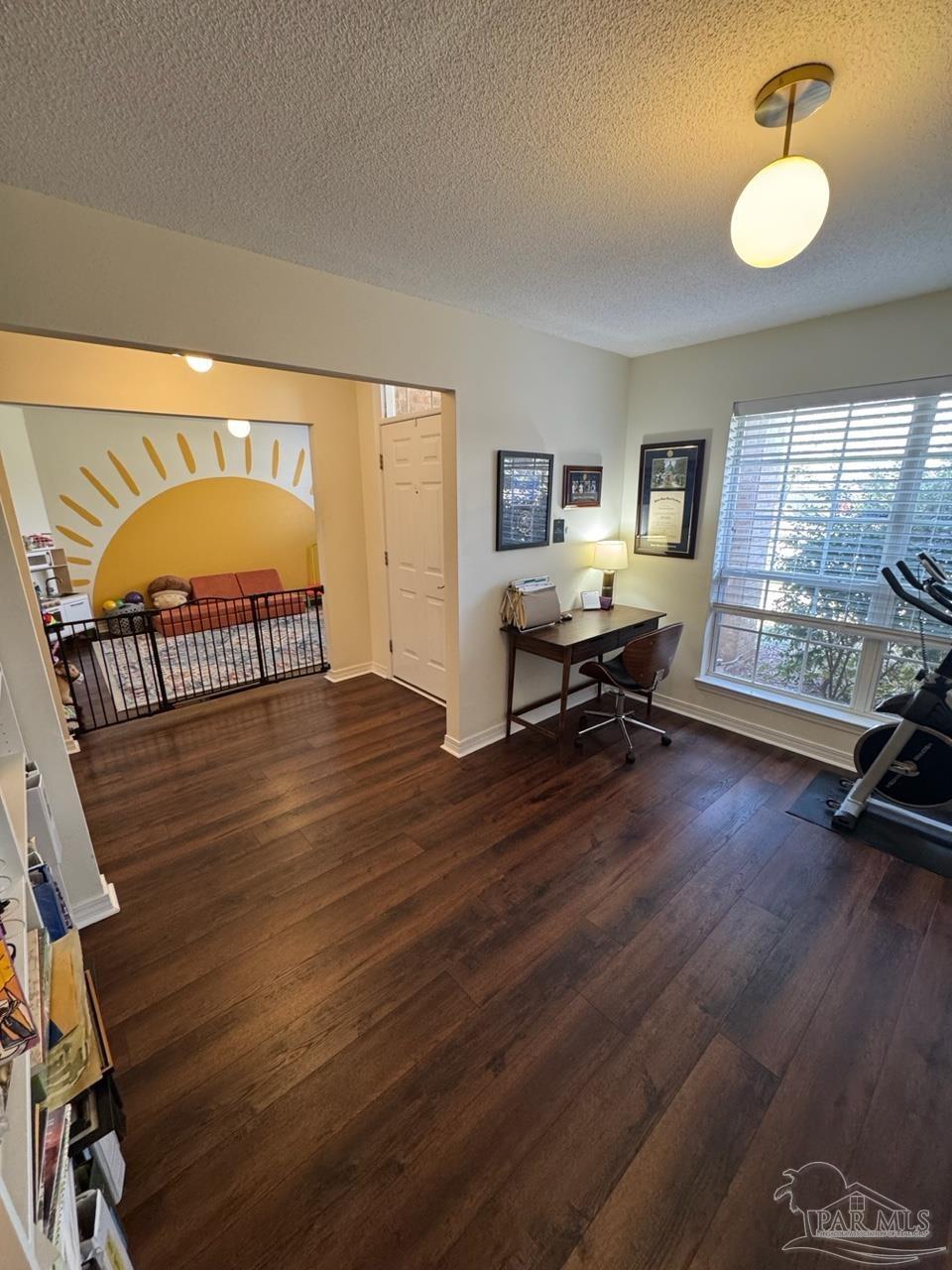 4930 Chads Circle Pace, FL 32571 - Photo 12 of 18 a living room with furniture and a wooden floor