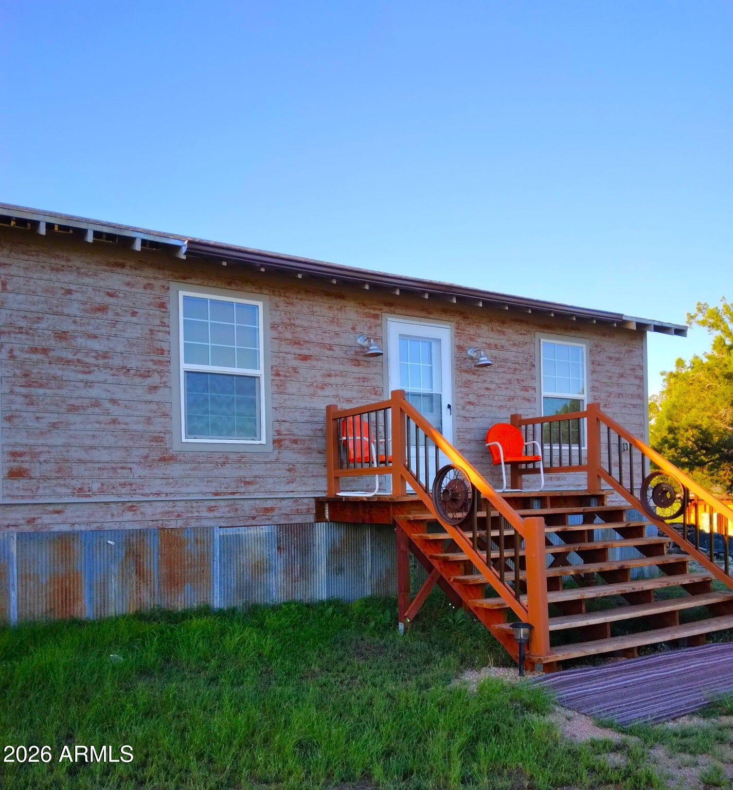 47966 Highway 288 Young, AZ 85554 - Photo 24 of 85 a front view of a house with balcony and a wooden fence
