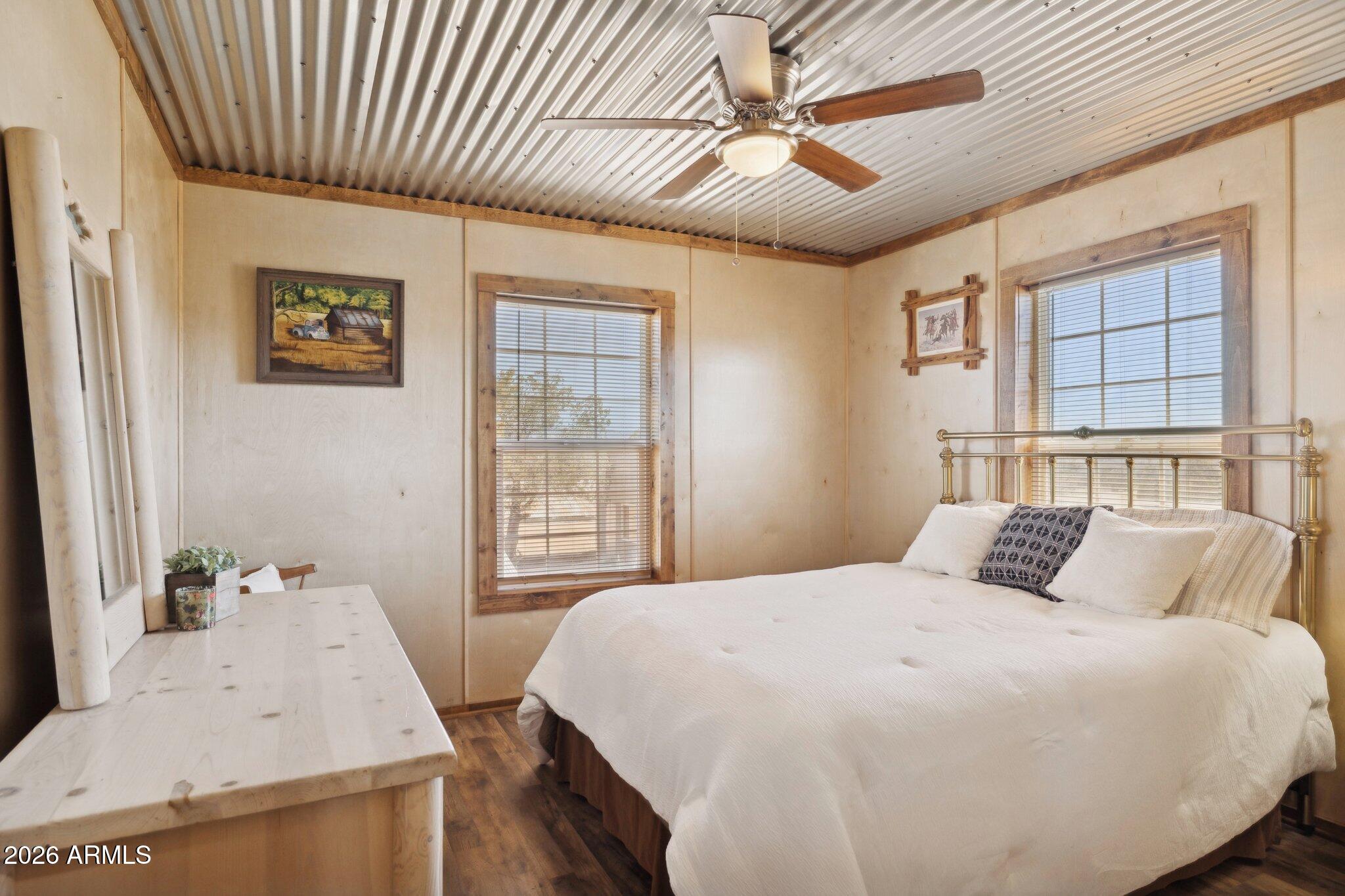 47966 Highway 288 Young, AZ 85554 - Photo 28 of 85 a bedroom with a large bed and a chandelier