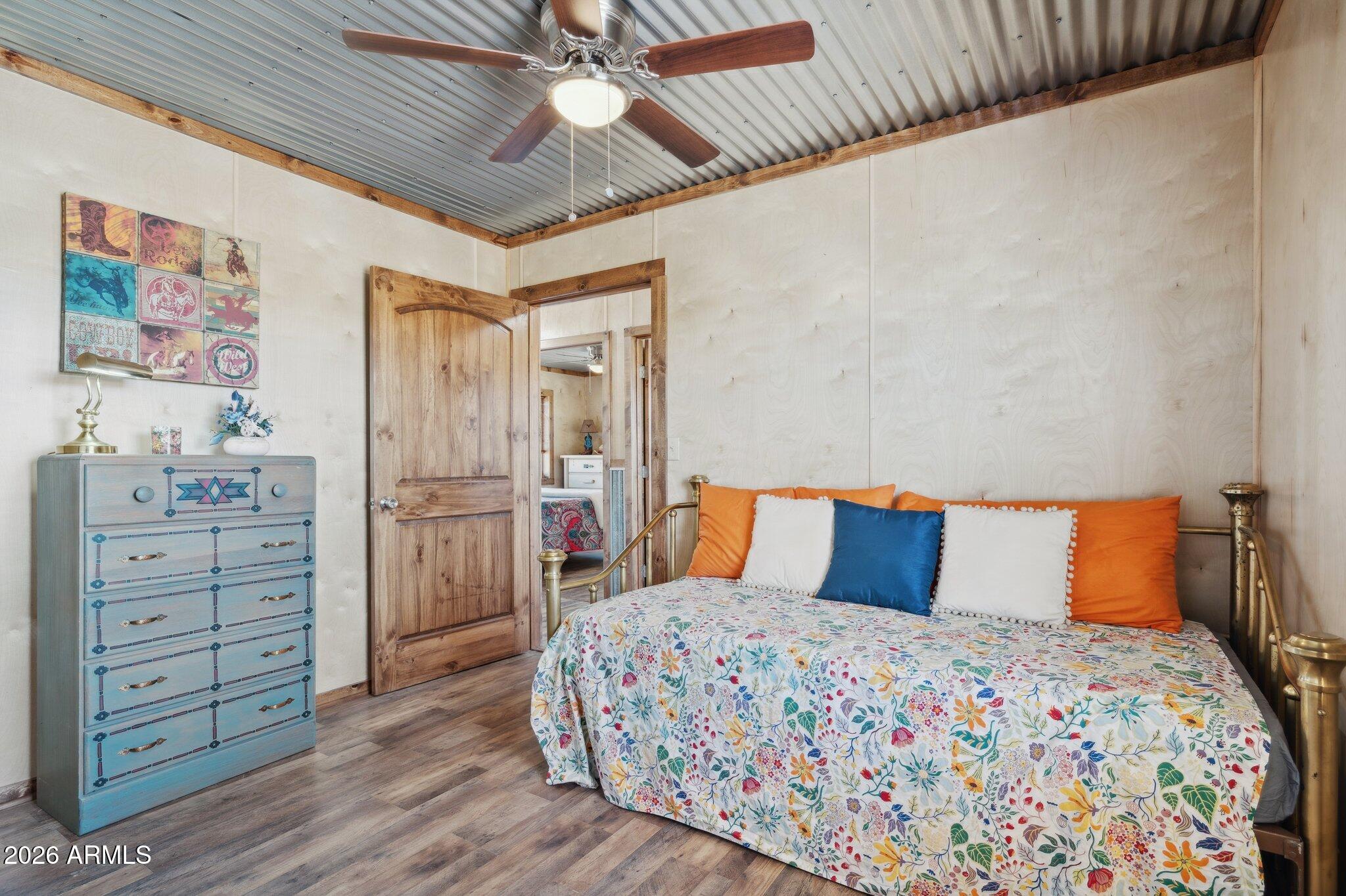 47966 Highway 288 Young, AZ 85554 - Photo 29 of 85 a bedroom with a bed and a chandelier