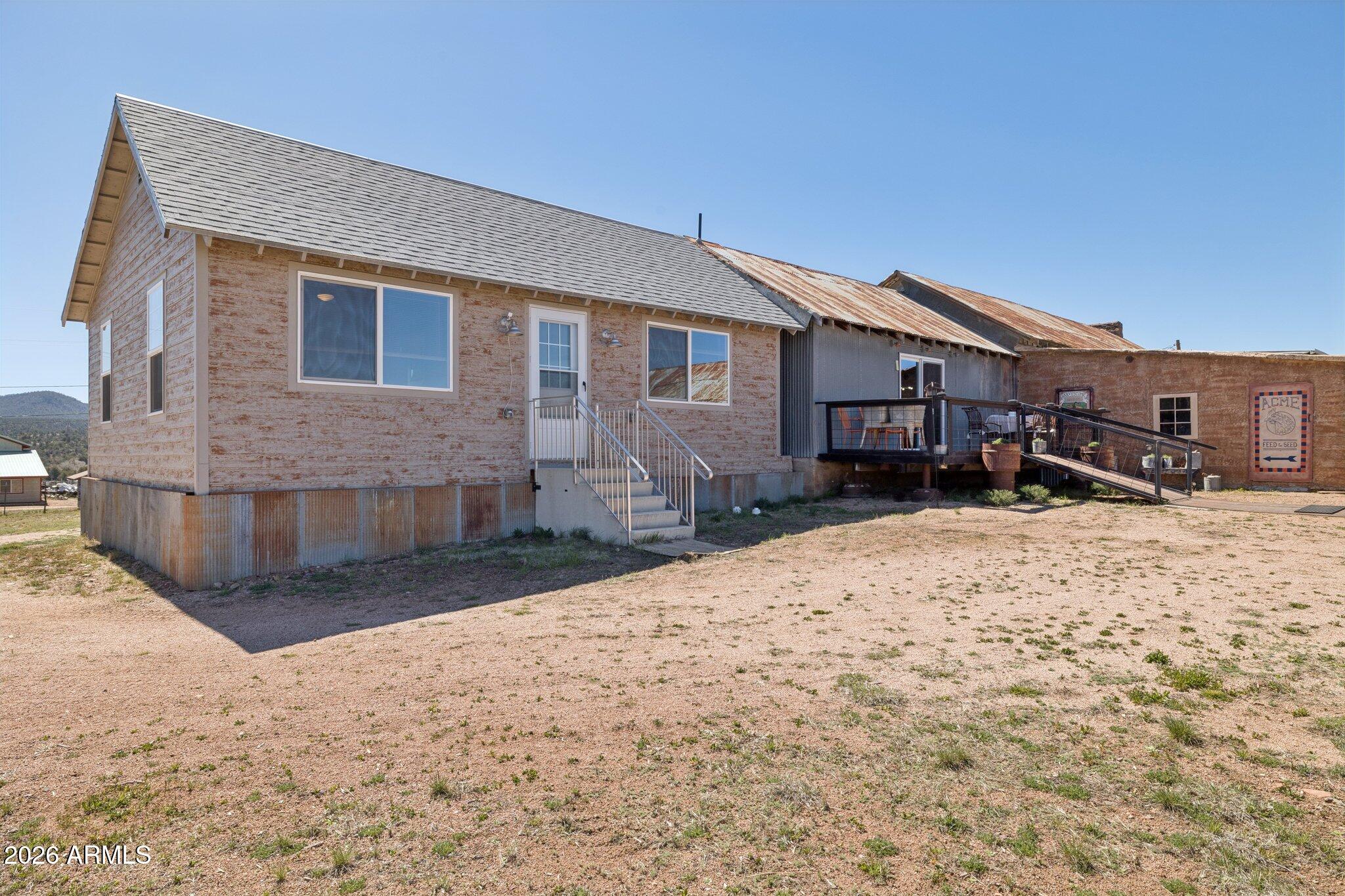 47966 Highway 288 Young, AZ 85554 - Photo 38 of 85 a front view of a house with a yard covered in snow