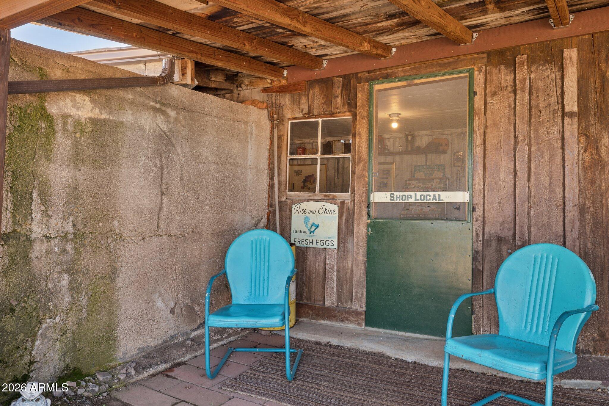 47966 Highway 288 Young, AZ 85554 - Photo 42 of 85 a view of a door chairs and porch with a table chair