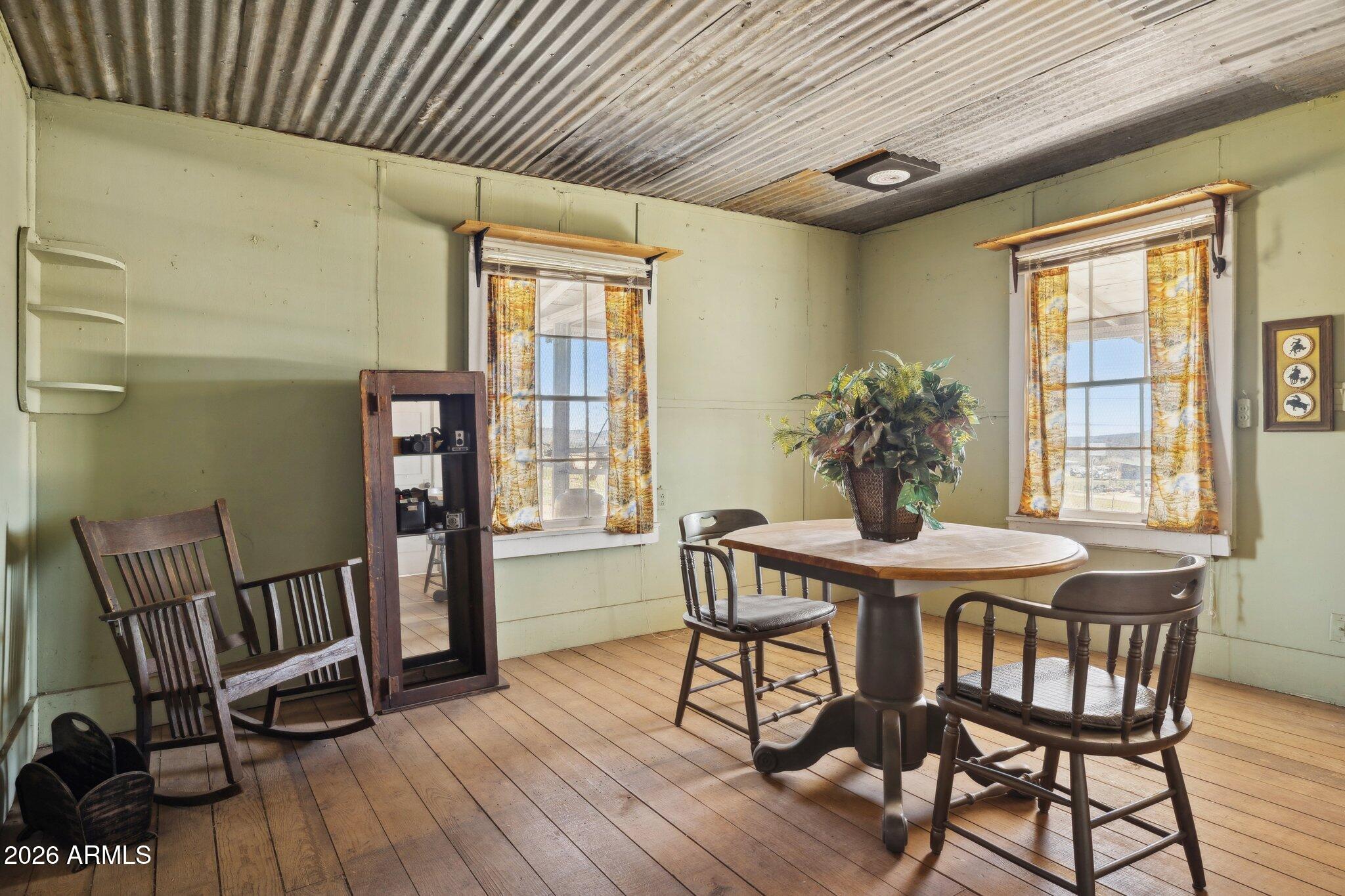 47966 Highway 288 Young, AZ 85554 - Photo 52 of 85 a view of a dining room with furniture window and wooden floor