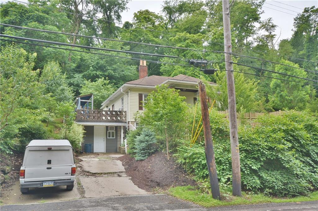 8239 Nadine Road Verona, PA 15147 - Photo 2 of 25 Country-like setting but convenient location. Driveway is being fixed this week.