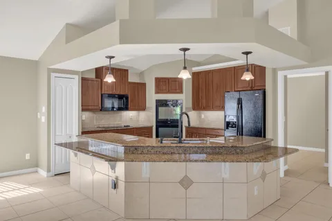 a bath tub sitting next to a window