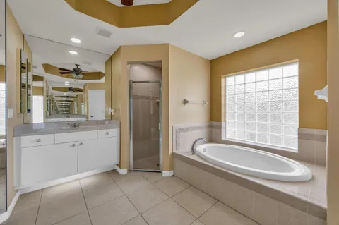 a view of a glass door with a glass door and a floor to ceiling window