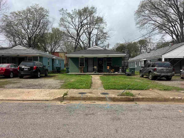 a view of street with parked cars
