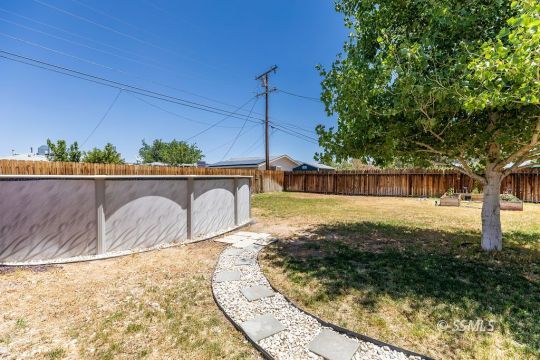 240 West Graaf Avenue Ridgecrest, CA 93555 - Photo 26 of 28 a view of a backyard
