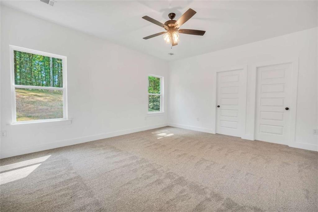 65 Lakeside Drive Covington, GA 30016 - Photo 27 of 35 a view of an empty room with a window