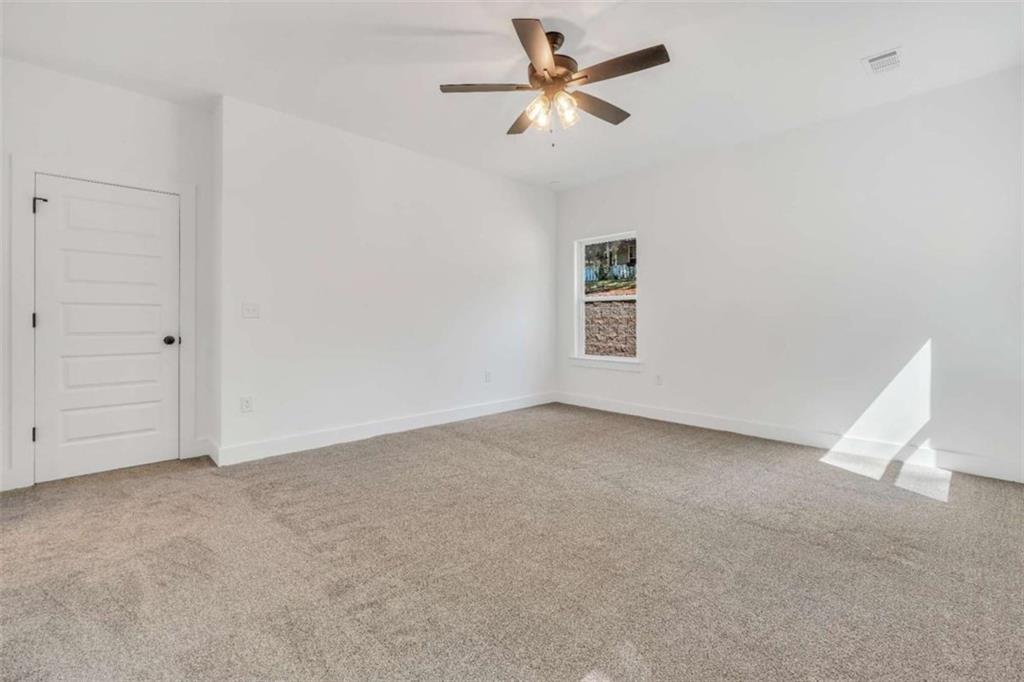 65 Lakeside Drive Covington, GA 30016 - Photo 29 of 35 a view of an empty room