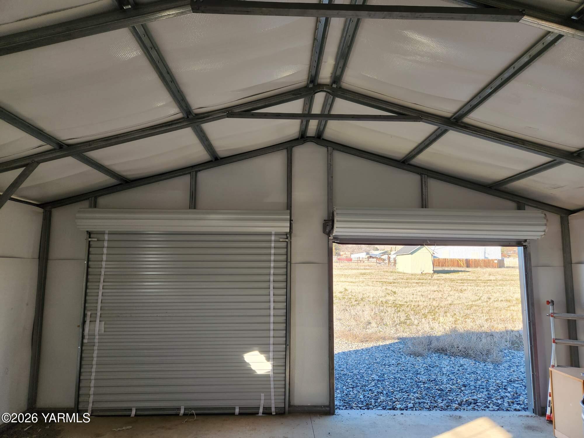 471 Gibson Road Selah, WA 98942 - Photo 13 of 13 a view of a room with wooden floor and windows