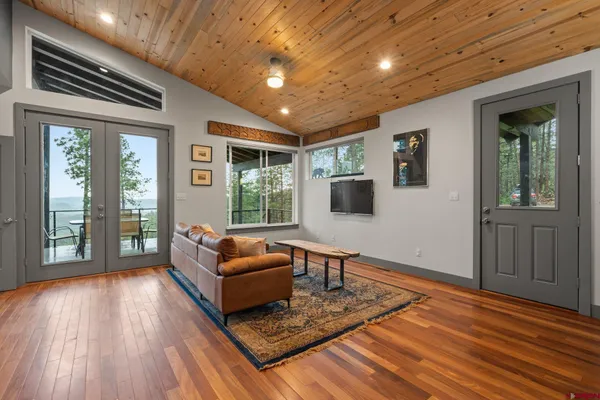 a bed room with a bed and a window