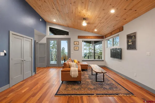 a kitchen with a refrigerator and a sink