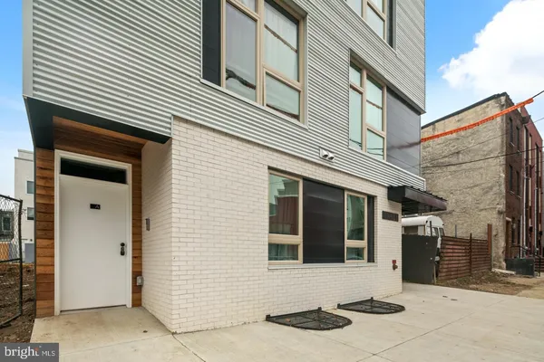 a front view of a house with a garage