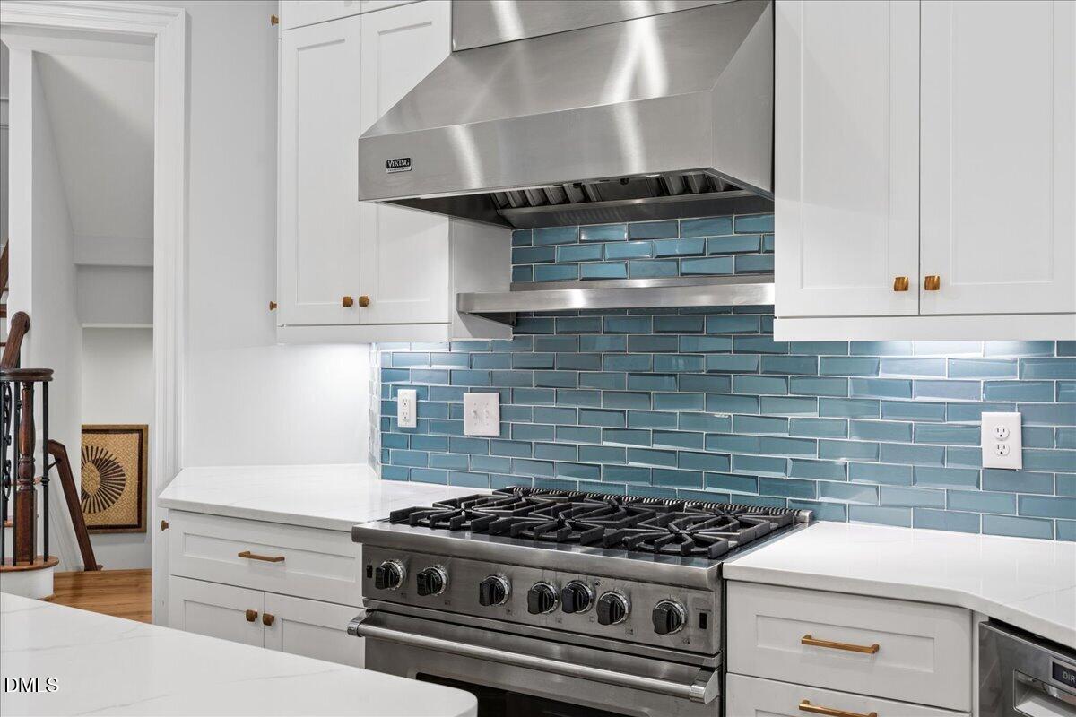 1504 Consett Court Raleigh, NC 27613 - Photo 6 of 81 Viking range and hood vent