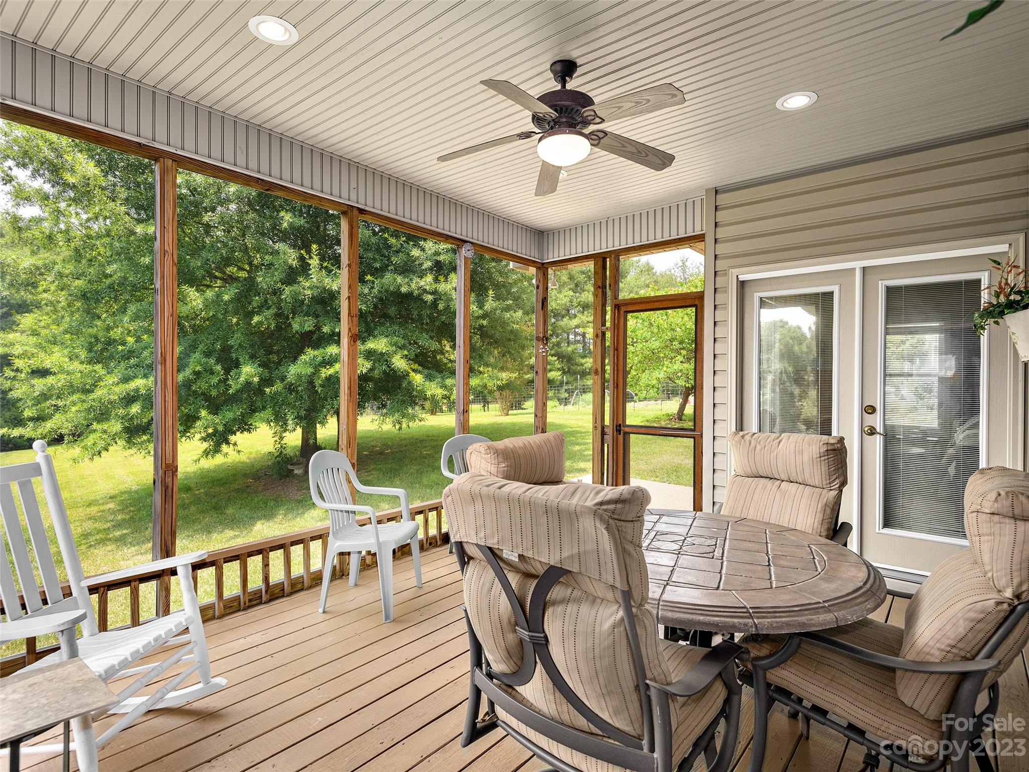 1223 North Ridge Road Hendersonville, NC 28792 - Photo 11 of 24 a view of a dining room with furniture window and outside view