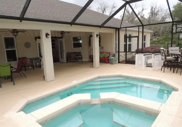 a room with table and chairs